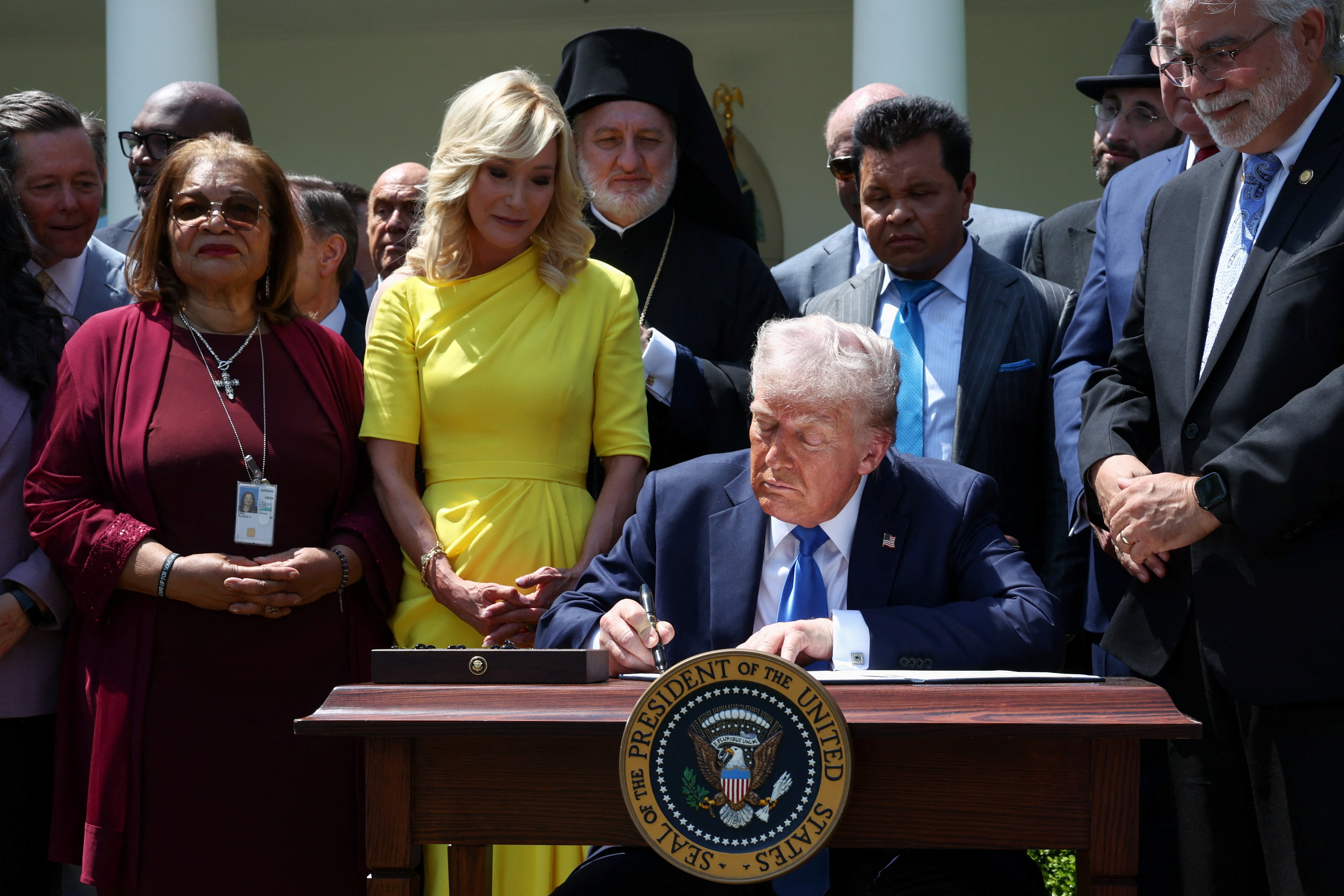 Trump signs order that aims to cut funding to NPR, PBS