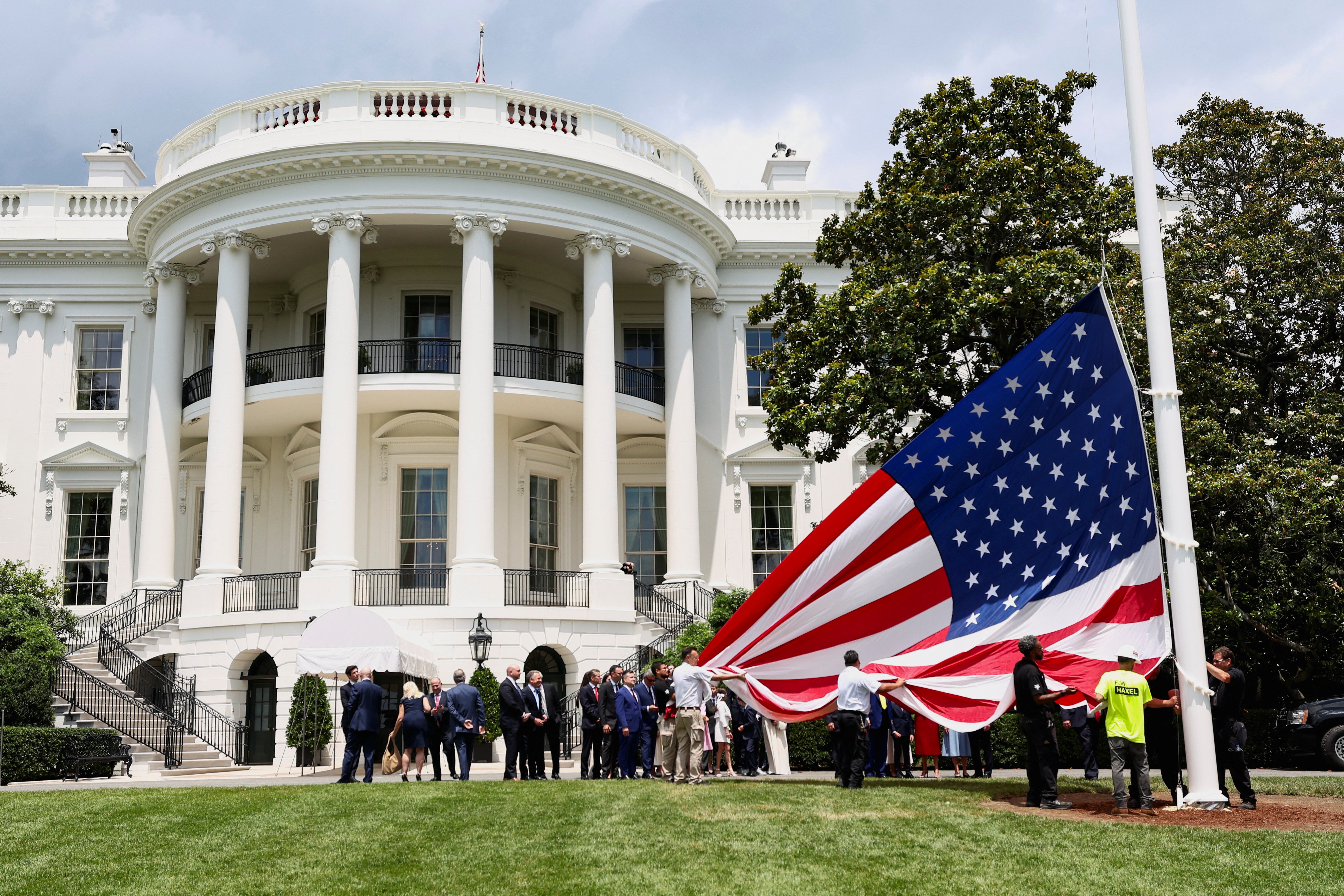 ‘The best poles anywhere in the country’: Trump installs gigantic US flags at the White House