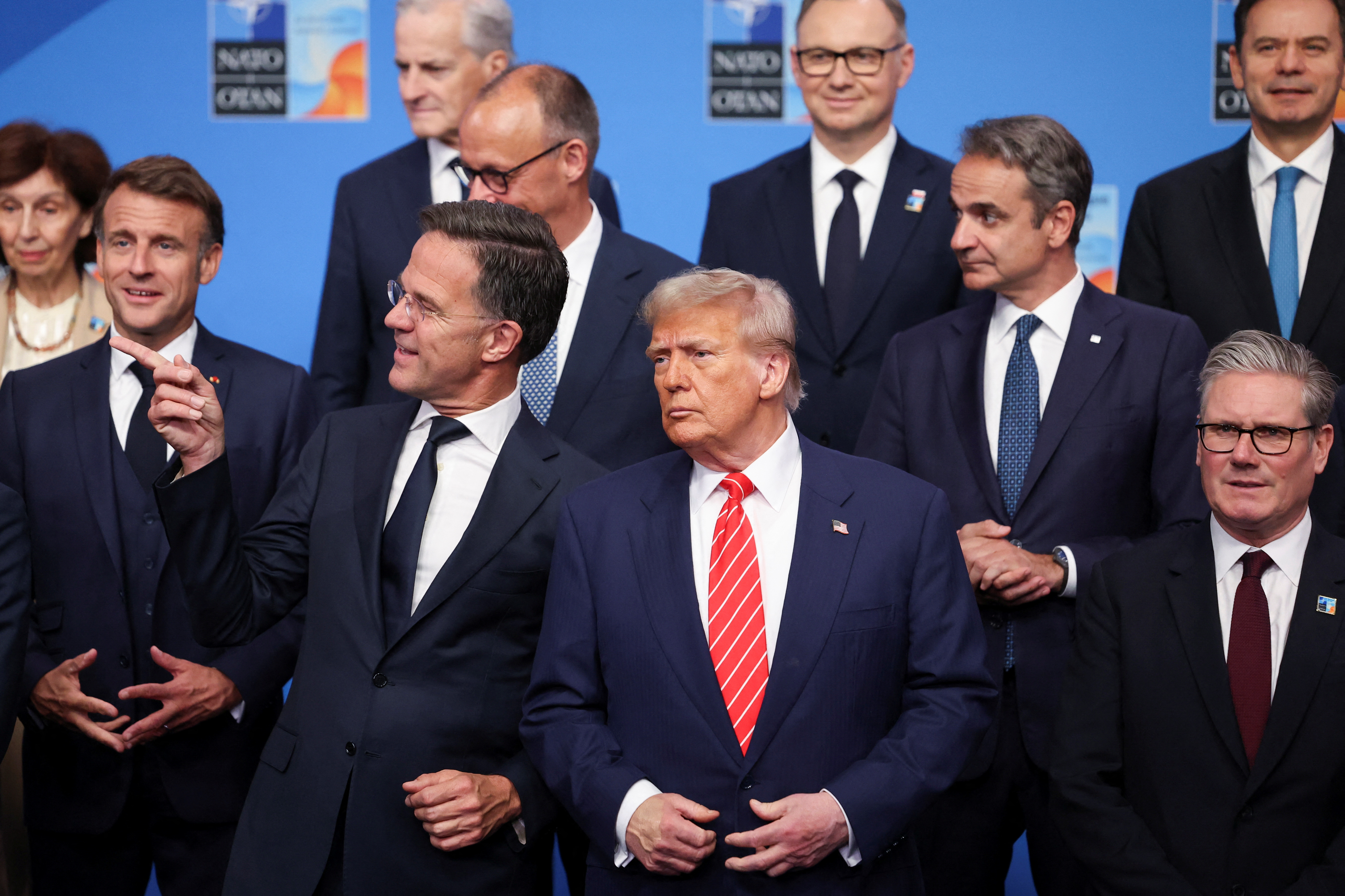 NATO commits to higher spending sought by Trump and mutual defence