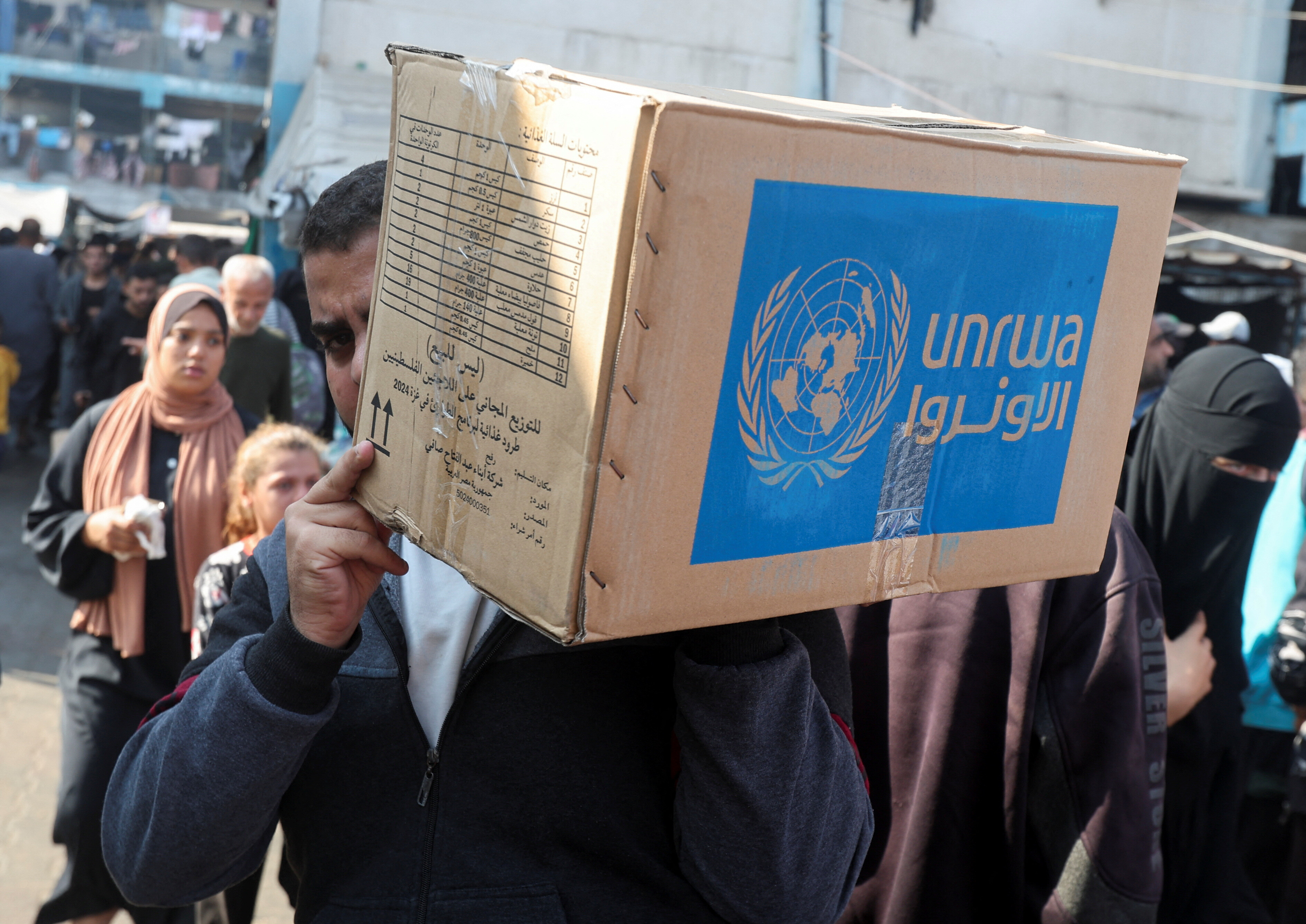 Middle East latest: Israel ends agreement with UN agency providing aid in Gaza